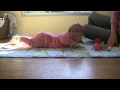 Halia plays on the floor 5 months