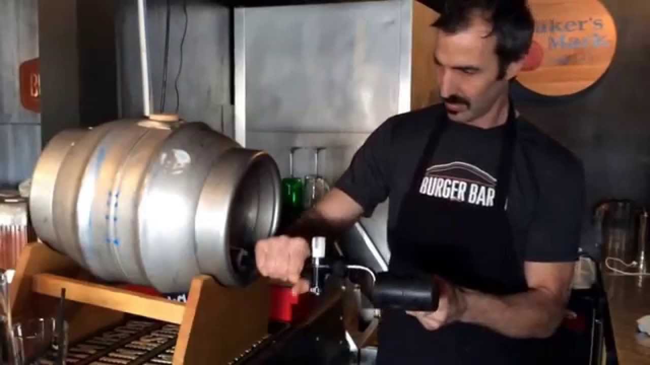 chef tony tapping firkin at burger bar 419 elevator brewing tap firkin flyer baltimore