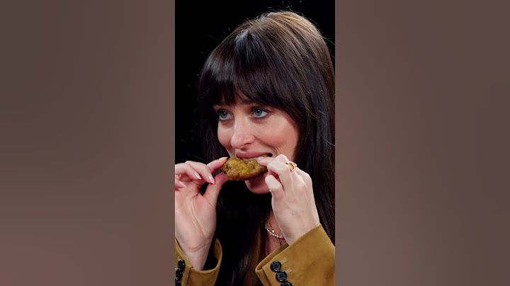 Dakota Johnson is NOT prepared for Hot Ones 😂