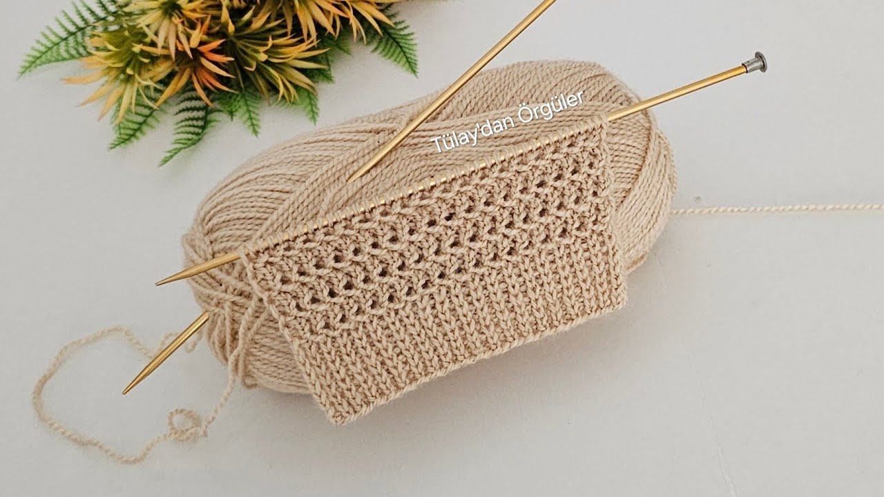 Элегантный и простой узор спицами для шалей, жилетов, кардиганов и свитеров.