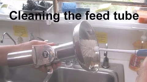 Cleaning a feed tube, grids and cutter for a WHF juicer or a Norwalk juicer