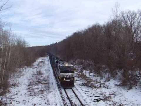 Norfolk Southern empty hopper train 533 is westbound on the WNY&P's former ERIE mainline at Venango Pennsylvania with ES40DC 7547 leading x-conrail SD60I 6742 and C40-8W 8349. The second angle is in the yard at Meadville