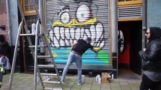 Chris Brown maakt een graffiti in Amsterdam