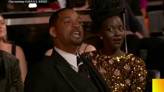 Watch the uncensored moment Will Smith smacks Chris Rock on stage at the Oscars, drops F-bomb