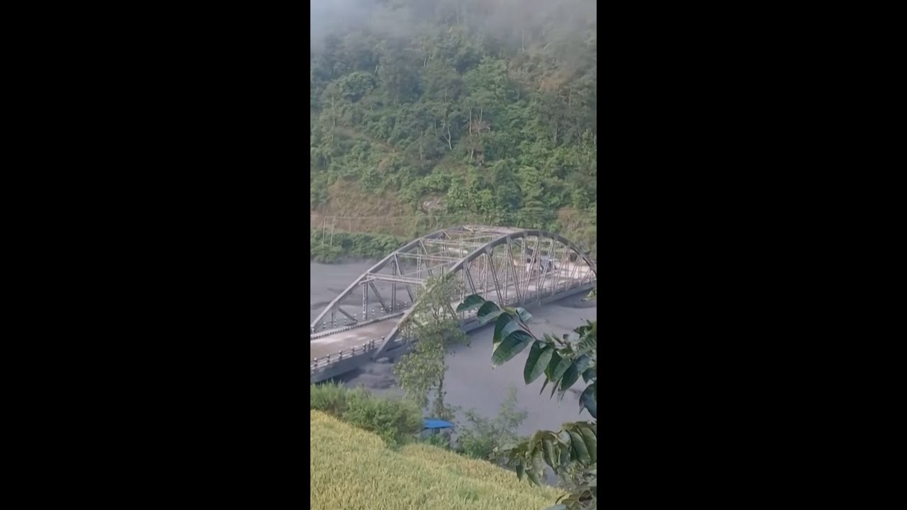 Bridge collapses after being knocked by floodwaters Bridge collapses after being knocked by floodwaters
