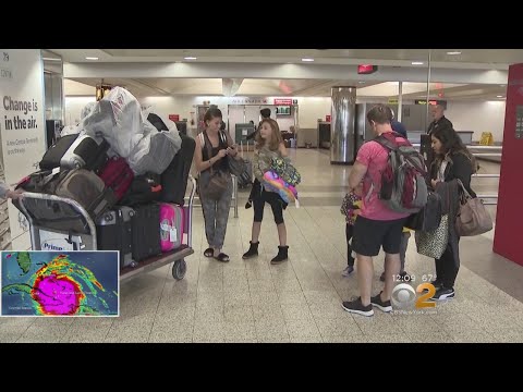 Florida Residents Fleeing Hurricane Arriving In NYC