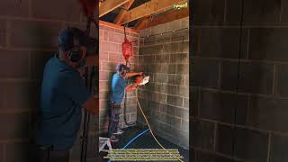 The Process of Cutting and Making New Door Access in a Brick Wall