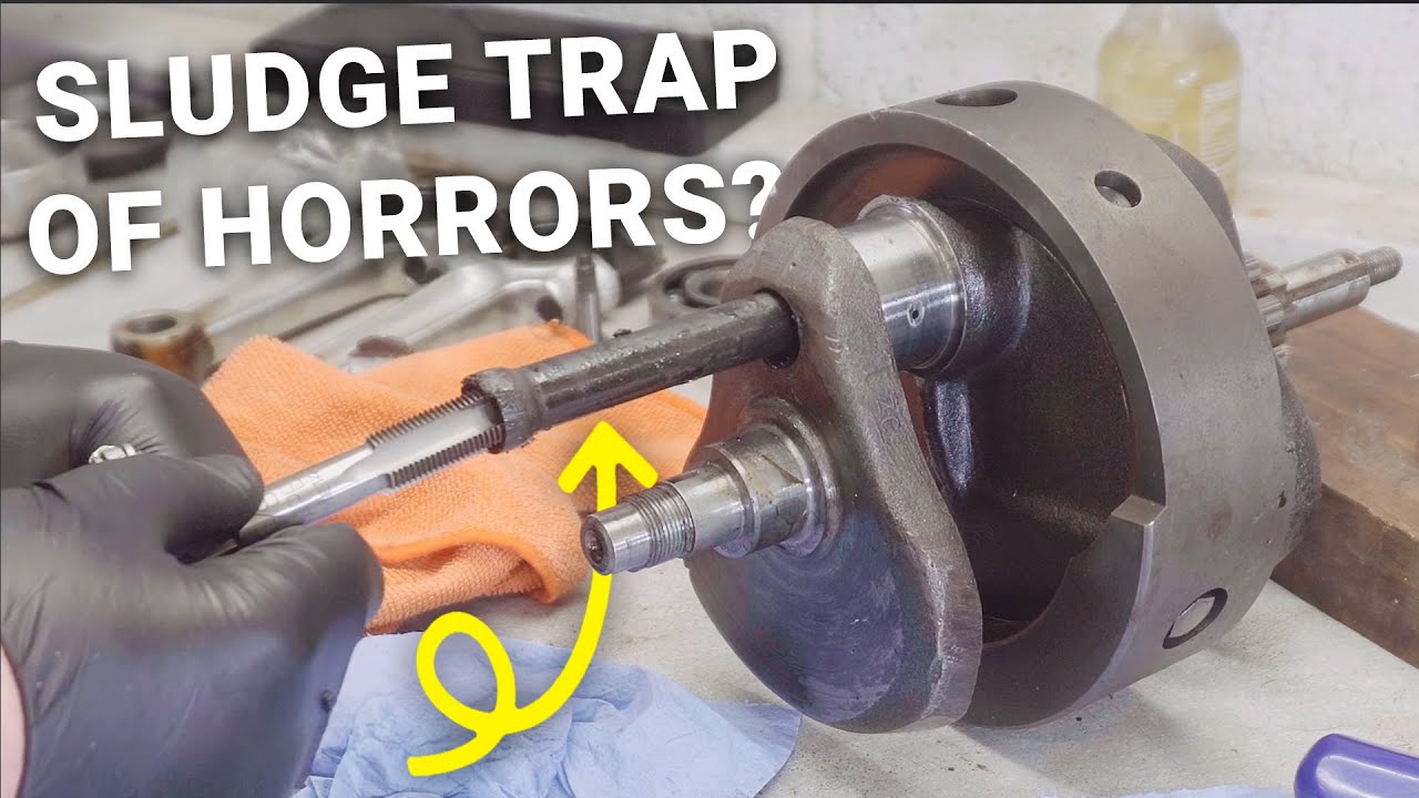 Удаление ловушки для осадка в мотоцикле Triumph T140V Scrambler V37