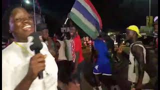 Gambians celebrate the victory of the Jr. Scorpions