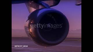 gettyimages 1BT8597 0034 640 adpp Turbofan of aeroplane spins on runway - stock video