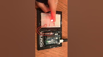 A simple circuit with a button switch to light up an LED
