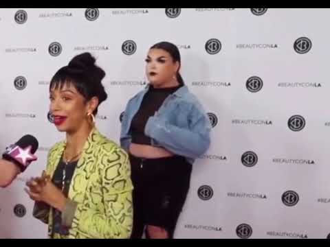 ghost standing behind liza koshy