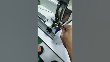 HH-345F  Tape Wrapping Machine with ficture to position cable,  is processing conductor ends