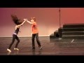 Yasha and Daniela rehearse a Chacha routine on the Alliance theater stage