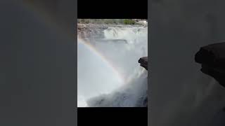 Cascading Hukou Waterfall meet rainbow