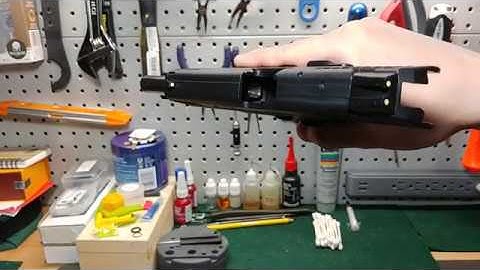 Heckler and Koch P30L with Grayguns Flat Trigger and Short Reset System for the P30 series pistols .