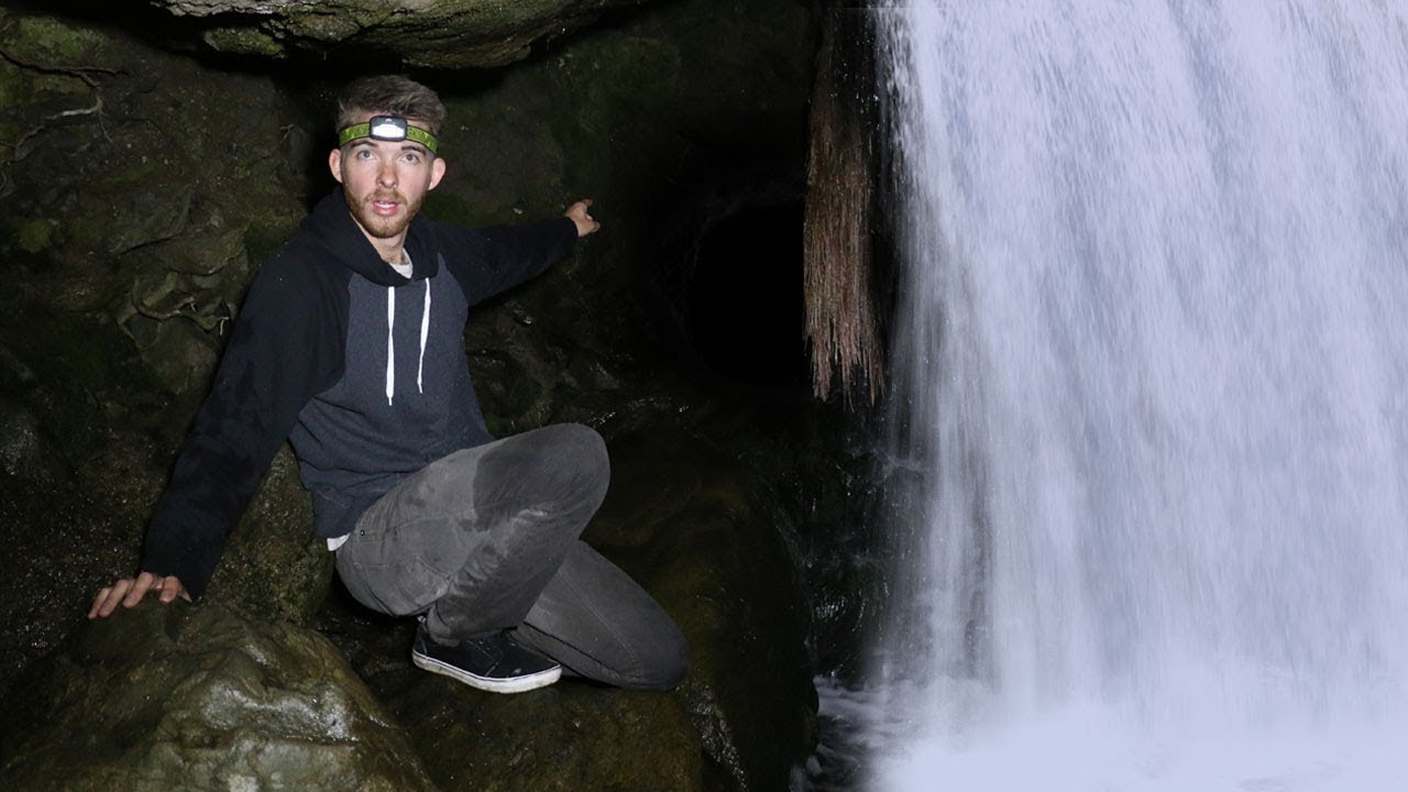 Exploring Secret Cave Hidden Behind A Waterfall Forest Survival