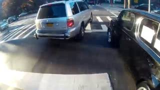Gray Honda SUV nearly right hooks me