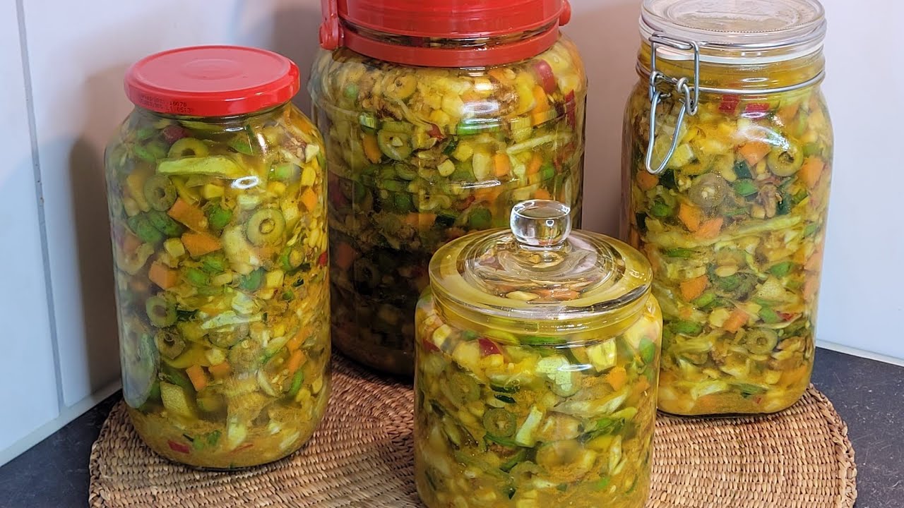 ترقيد او تصبير الزيتون بدون بذور مع الخضار بزيت الزيتون يبقى على لونه الطبيعي لأكثر من عام