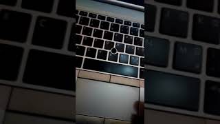 Why and how unlock Laptop touchpad  Showing Red Light