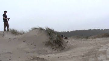 Losi DBXL  Full throttle LAUNCH in dunes..stock