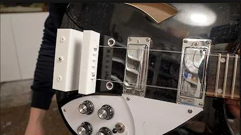 Floating guitar strings playing test (extreme magnet warning)
