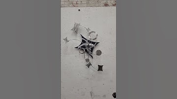Wall mounted, interactive,  kinetic sculpture.