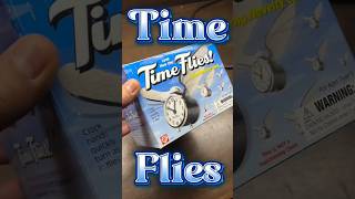 Flying clock toy