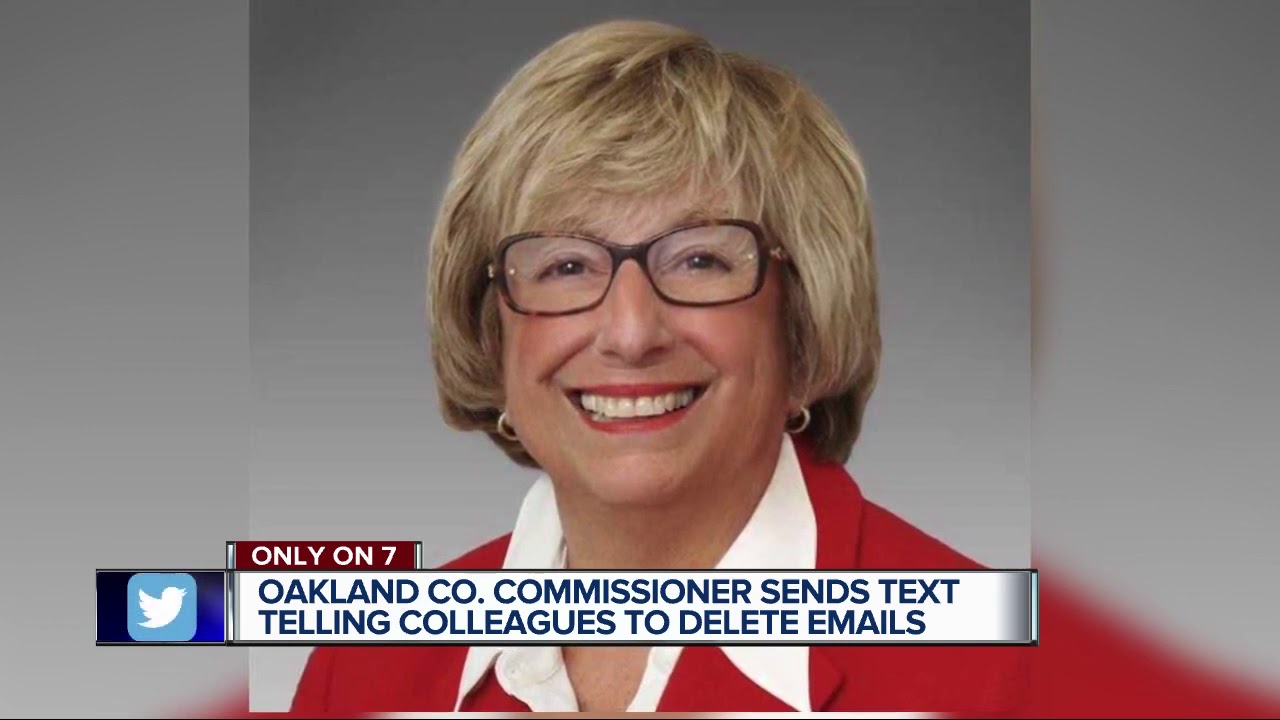 channel awesome Oakland Co. Cover-up? Text that reads DELETE, DELETE, DELETE over L. Brooks Patterson's seat