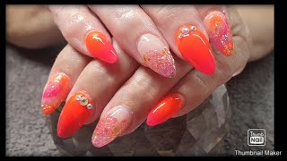 neon pink and orange holiday nails