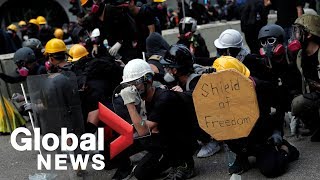 Bricks and tear gas: violence escalates in hong kong’s latest clash
between protesters police