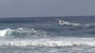 Boat Jumping Over Reef