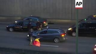 Police clash with striking taxi drivers in Paris