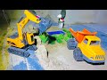 Rc excavator checking miniature village construction  science project 