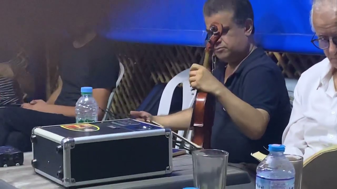 istikhbar Violon Jamal ben Allal au café Zriraq Azilah. Août 2022.استخباركمان استاد جمال بن علال