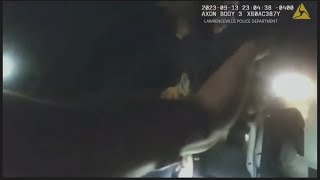 Lawrenceville police, good Samaritans lift vehicle off driver crushed underneath