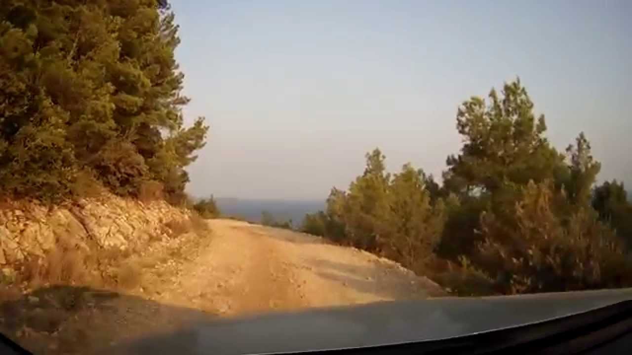 Rocky road drive from bay Lucisca to Sveta Nedjelja on island Hvar, Croatia