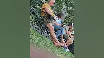 Older Guy Bare Feet In The Park