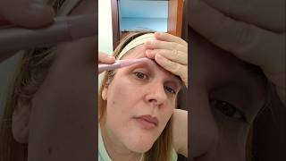 Removendo sobrancelha com a caneta depiladora da Shopee