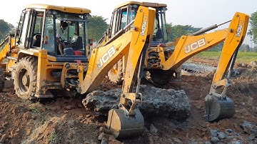 Two JCB Backhoe Machine Throwing Out Broken Bridge Concrete - JCB Working For Bridge Construction