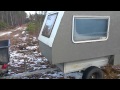 Campermodul i skogen med skidVM