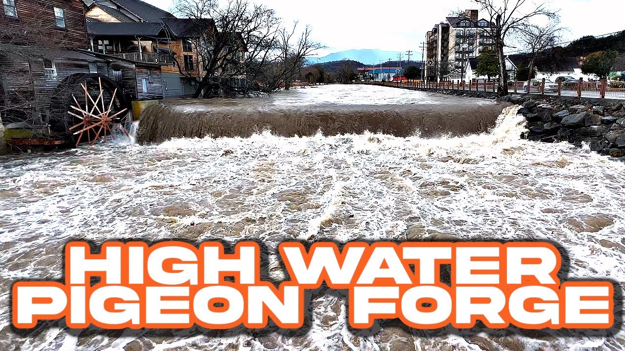 Pigeon River flooding in Pigeon Forge behind Christmas Place