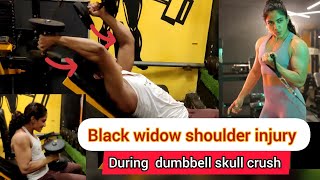 Black Widow Shoulder Injury . During Dumbbell Skull Crush