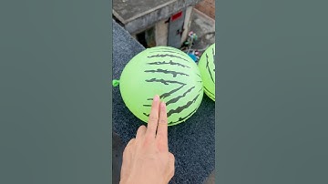 Experiment: Will a water balloon explode if it rolls down from a tall building? 💥🎈 #balloon