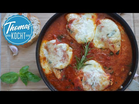 Video: Wie Man Hühnchen Mit Tomaten Und Käse Im Ofen Kocht