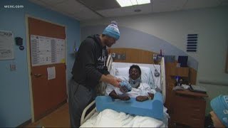 Panthers' Greg Olsen visited injured high school football player