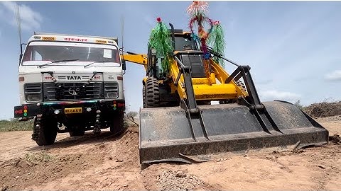 Jcb 3dx backhoe mud loading in tata tipper 1618 l Jcb 3dx mud loading