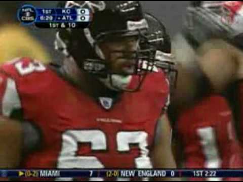 Michael Turner takes on tacklers