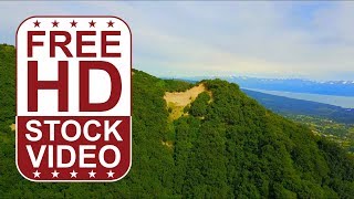 Free Stock Videos – aerial drone footage of beautiful green mountainside in Alaska