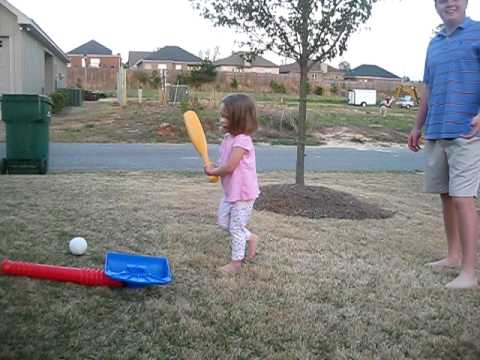 Libby playing T-ball
